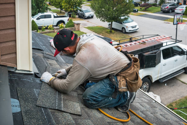 Professional Roofing technician working in Peace Dale, RI